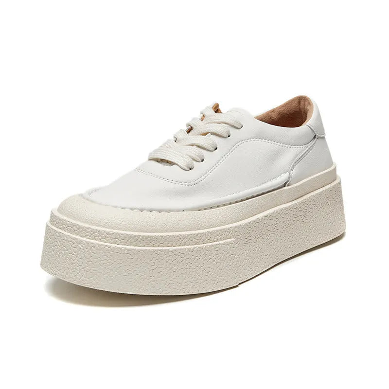 Women's black and white platform casual shoes with embossed cowhide leather and round toe design