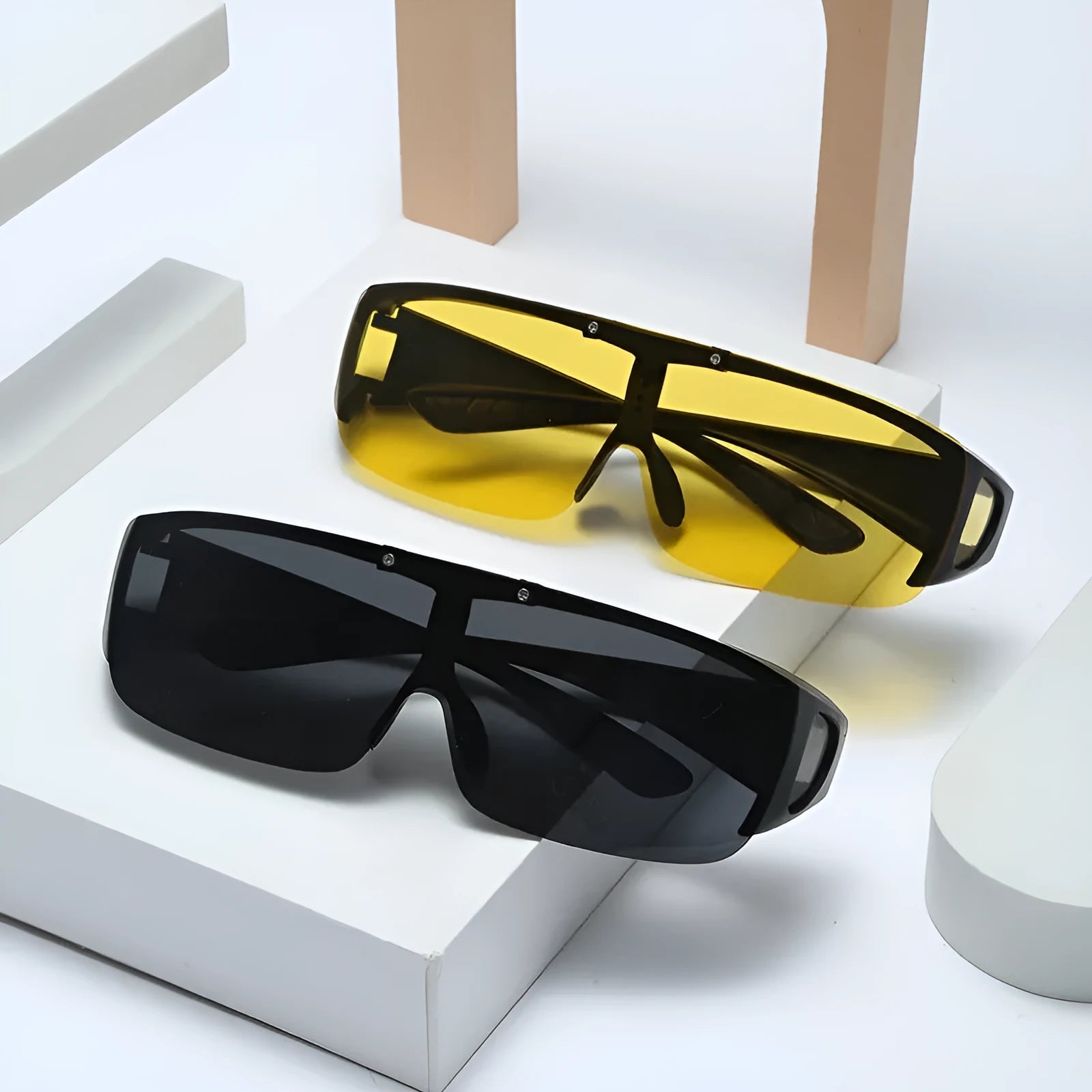 Polarized clip-on sunglasses with a one-piece frame shown in multiple lens colour options including black and grey