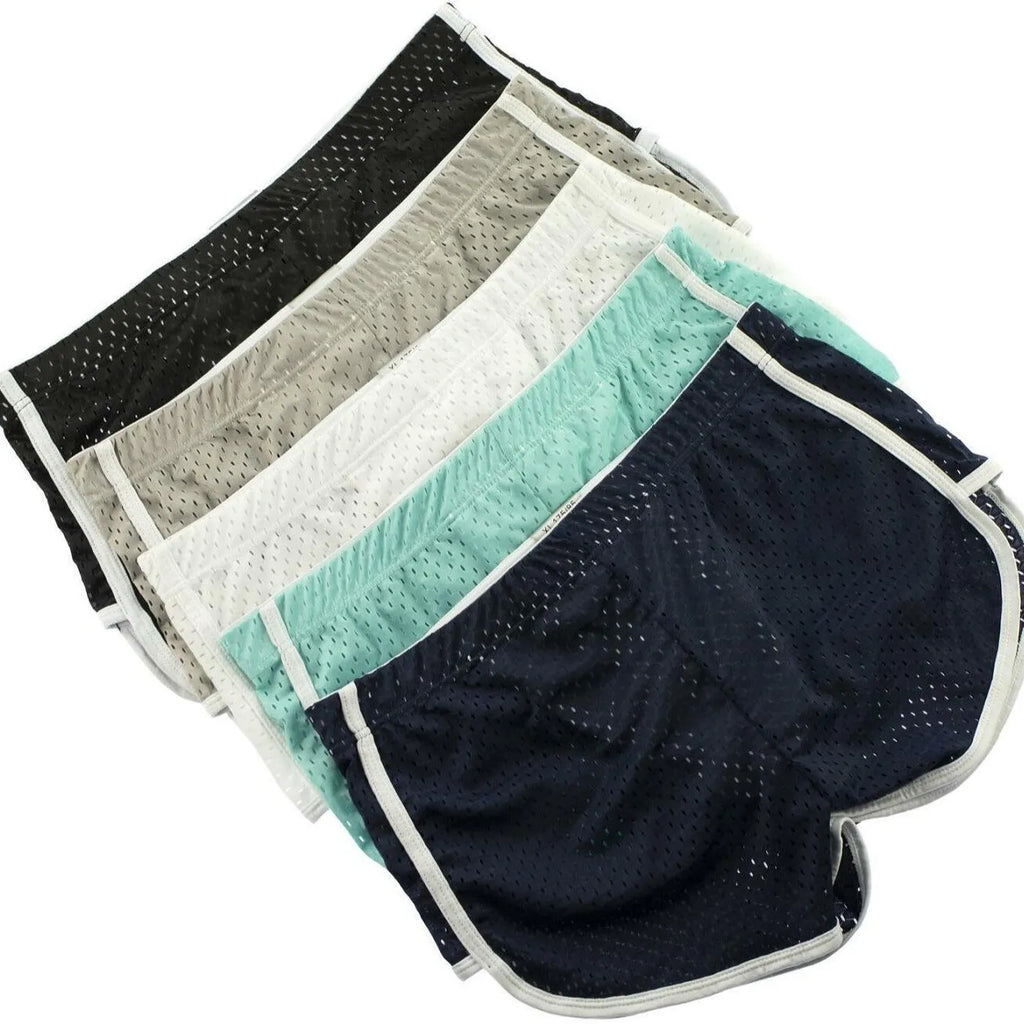 Men's cotton three-point boxer shorts in light blue on a grey background