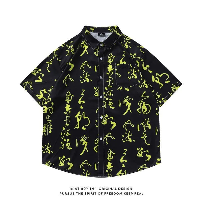 Loose fit short sleeve shirt with all-over floral print, cardigan style, in a polyester fabric.