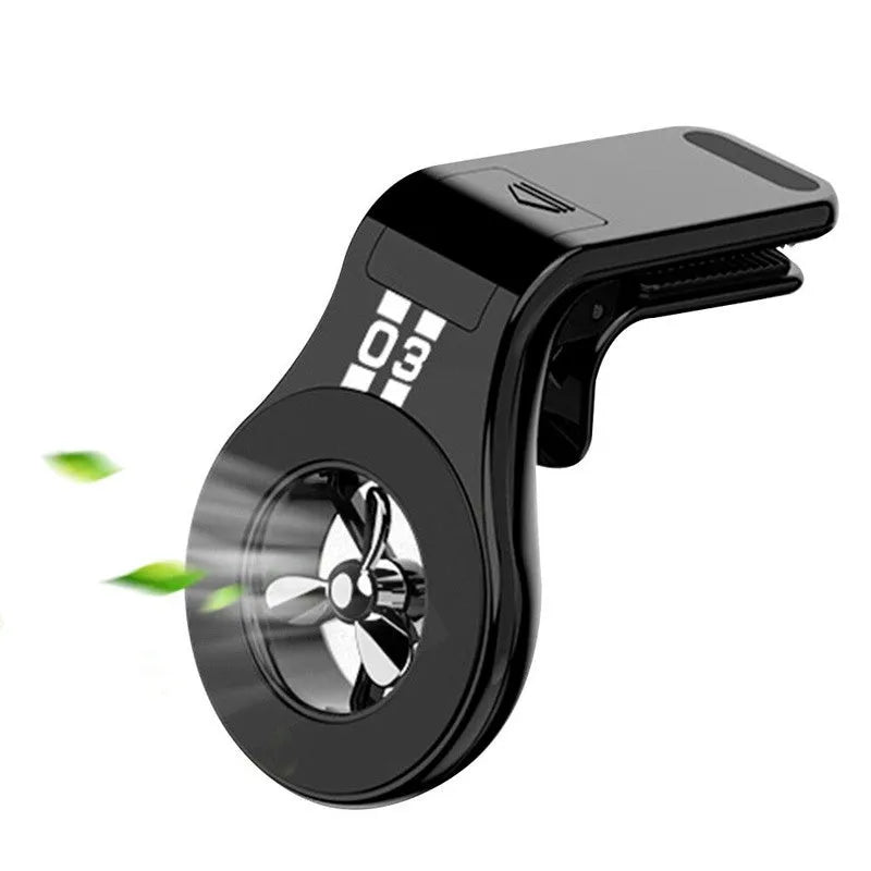 Black magnetic car air vent phone holder with adjustable clip and perfume slice attached