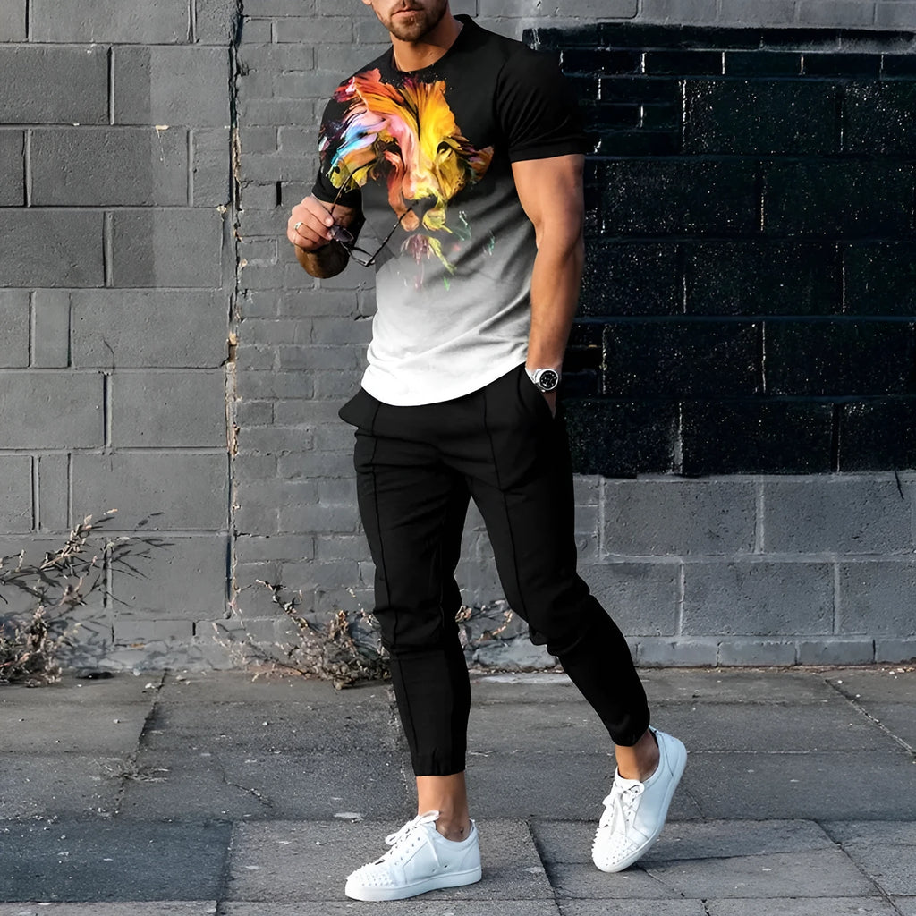 Man wearing a short-sleeved printed round neck pullover and matching trousers from a lightweight athletic suit set.