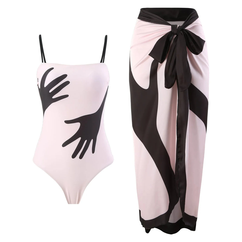 Women's patterned bikini swimsuit with a lightweight white tulle skirt attached.