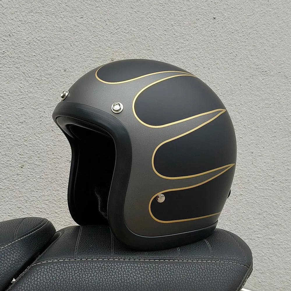 Retro-style half helmet for motorcycles with a fibreglass shell shown in a cement grey colour.
