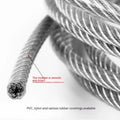Close-up of a coiled 304 stainless steel multi-strand security cable on a grey background.