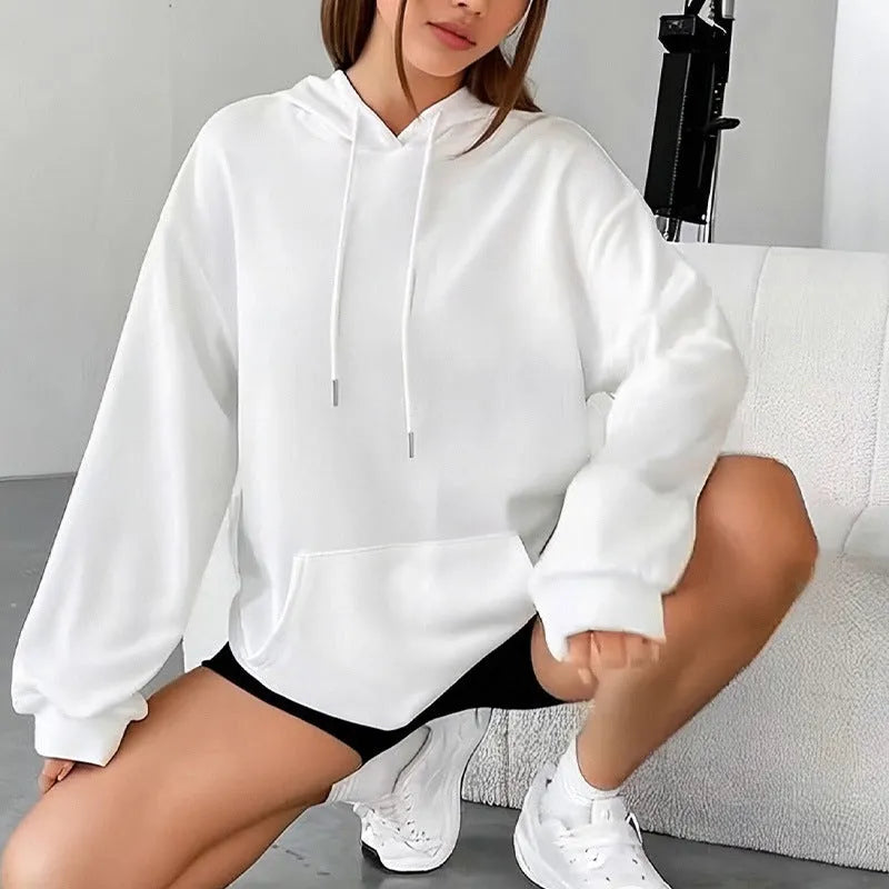 Women's loose fit grey drawstring hood sweatshirt with front pockets, long sleeves