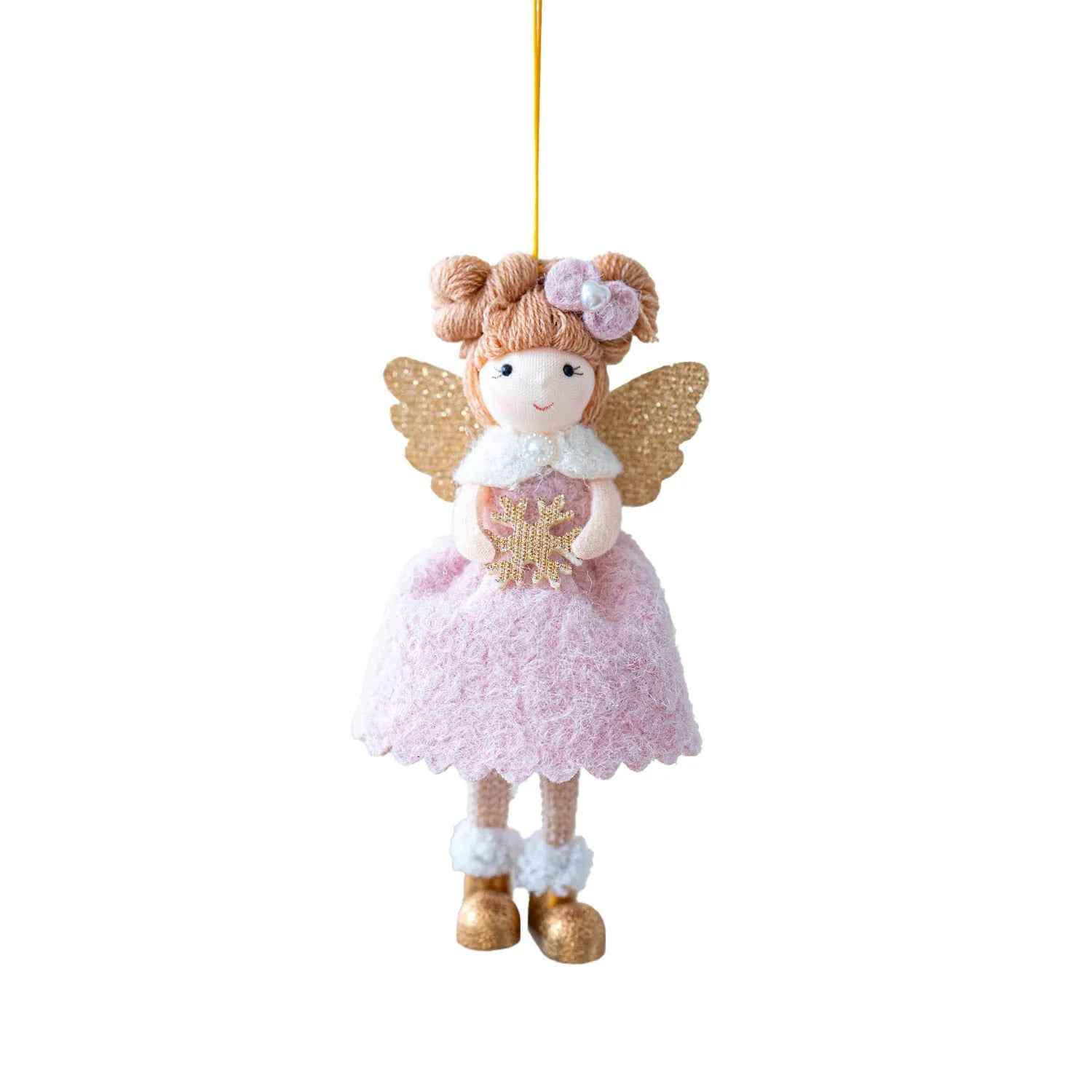 Pink and white cloth angel wings plush pendant Christmas ornament hanging against festive background