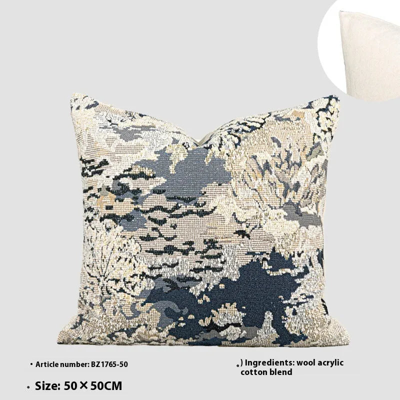 Antique blue decorative cushion with abstract floral artistic pattern on wool blend fabric, shown in square and rectangular sizes.