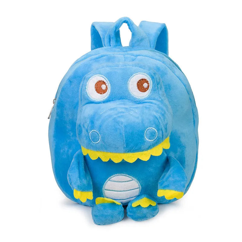 Soft blue plush dinosaur backpack for kids with embroidered character detail and a soft handle.