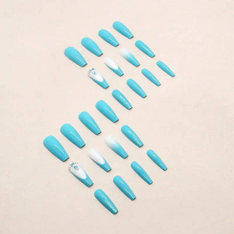 Long ballet nail art patches in smart blue diamond colour with scattered diamond debris detailing