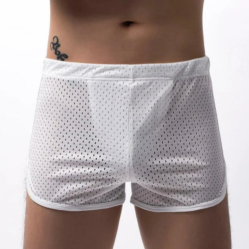 Men's cotton three-point boxer shorts in light blue on a grey background