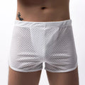Men's cotton three-point boxer shorts in light blue on a grey background