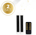 Set of four slim black LED taper candles with a realistic 3D flickering flame effect.