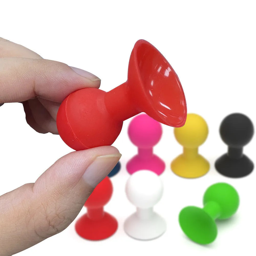 Creative solid colour silicone octopus ball mobile phone holder in blue, flexible universal stand for hands-free use