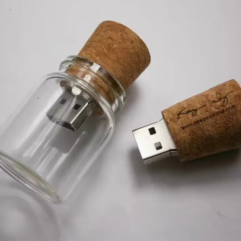 Clear glass bottle USB flash drive with wooden cap showing internal component