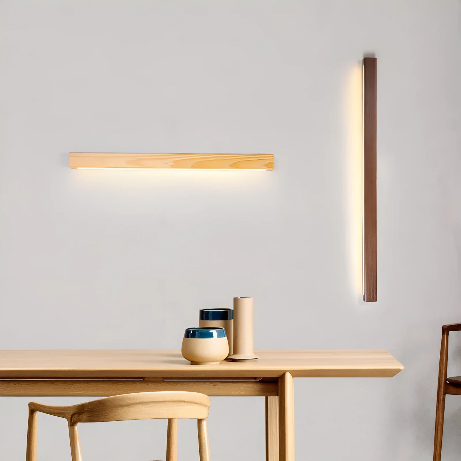Walnut coloured linear wood and acrylic LED strip wall lamp mounted on a wall.