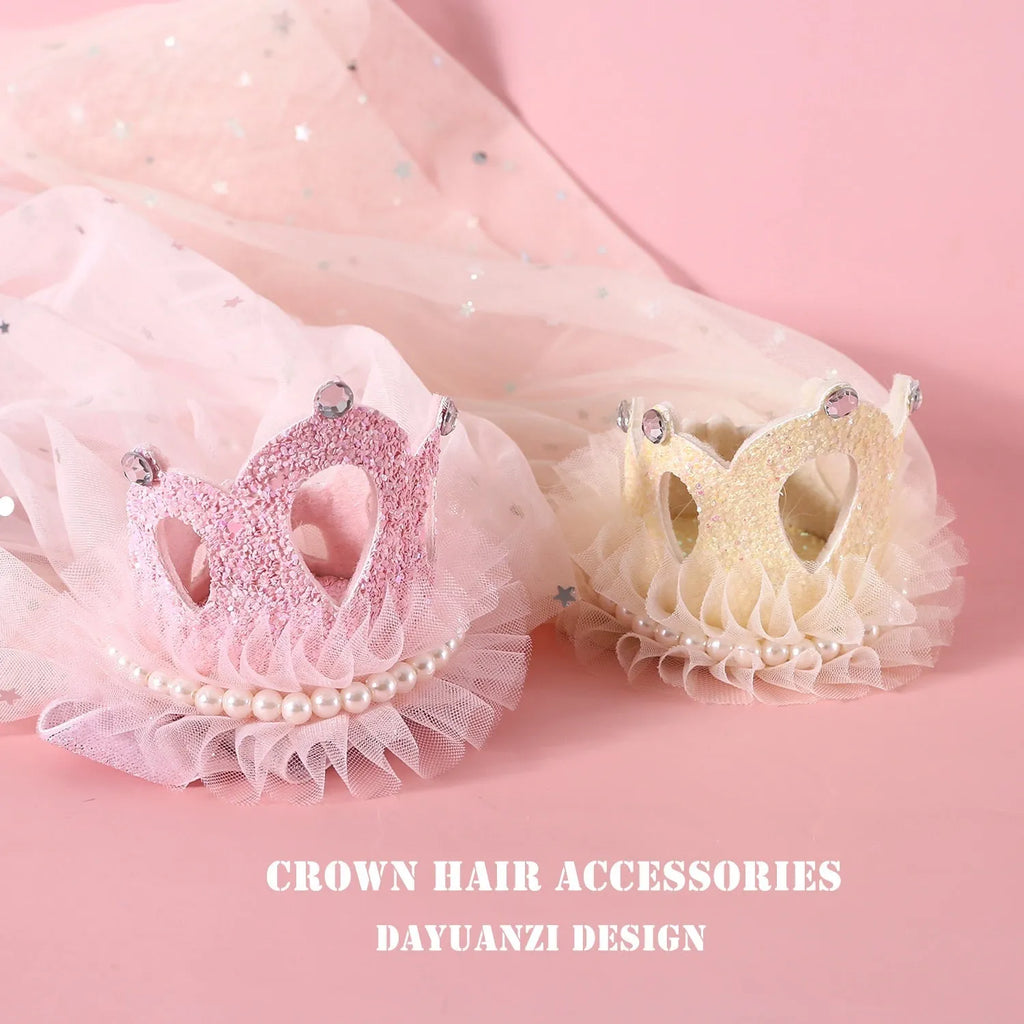 Cat wearing a princess crown headdress with a long, flowing veil in beige or pink colour.