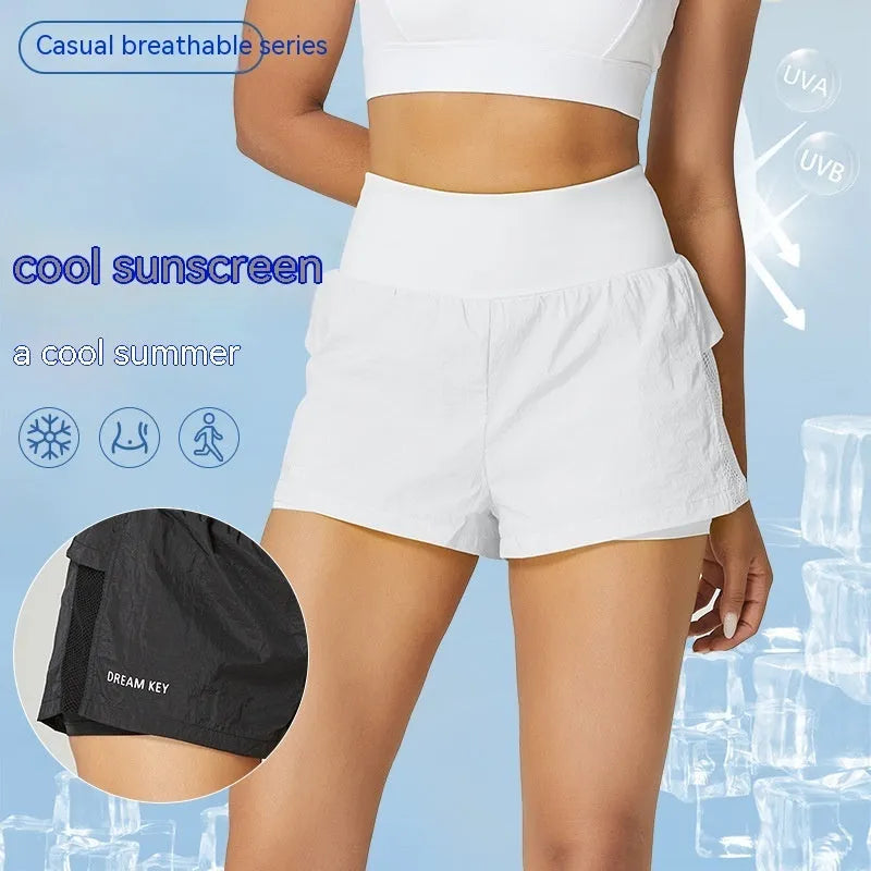Women's loose casual cotton blend quick-drying sports shorts in multiple colours on a hanger.