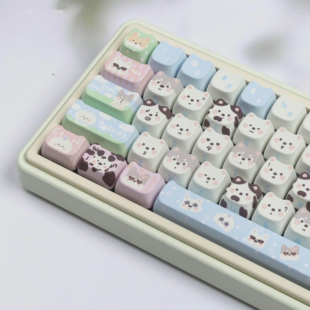 Full set of PBT plastic keycaps for mechanical keyboards with colourful sublimated cat and puppy animal designs.