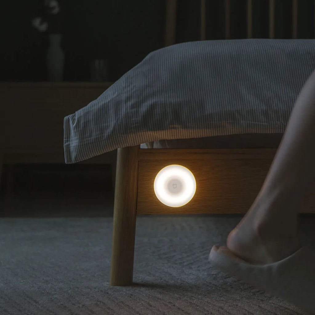 White modern bedside table lamp with Bluetooth and human body induction sensor.