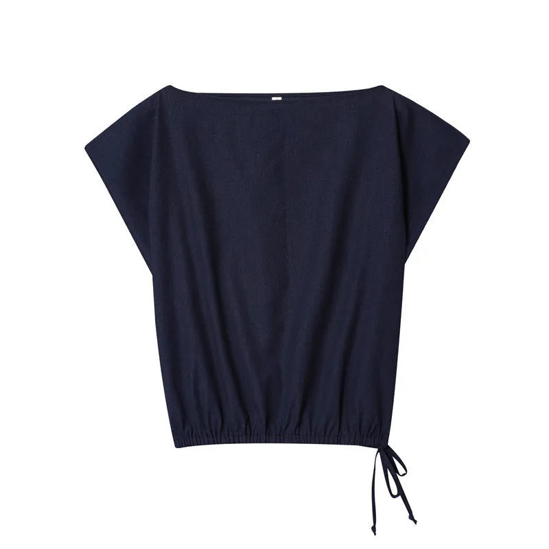 Women's linen blend co-ord suit with flounced sleeve top and wide leg trousers.