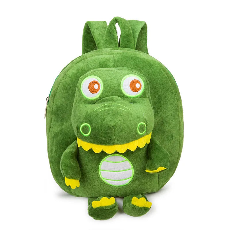 Soft blue plush dinosaur backpack for kids with embroidered character detail and a soft handle.