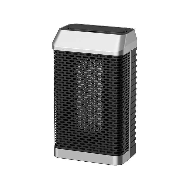 Black remote control desktop smart heater with oscillating head on a wooden desk.
