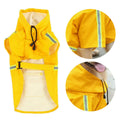 Waterproof dog raincoat in synthetic leather with reflective stripe and hood on a small dog
