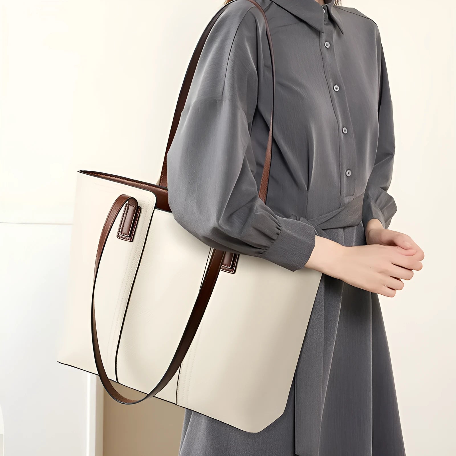 Women's genuine leather crossbody commuter bag in horizontal square shape with multiple internal compartments