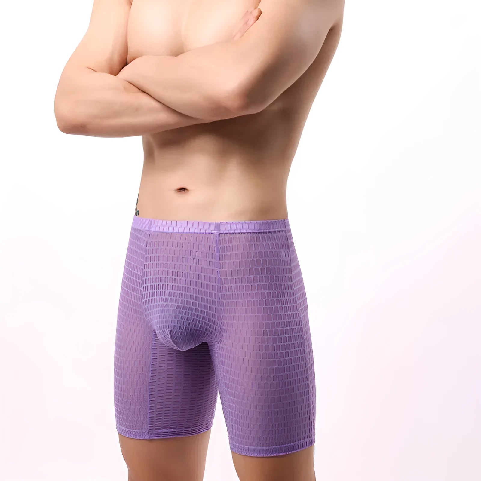 Men's white lace boxer shorts with a mid-waist and lengthened cut on a neutral background.
