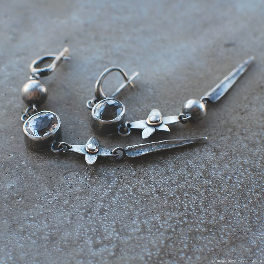 Geometric antique silver-plated earrings with XINGX chain design and rhinestone accents