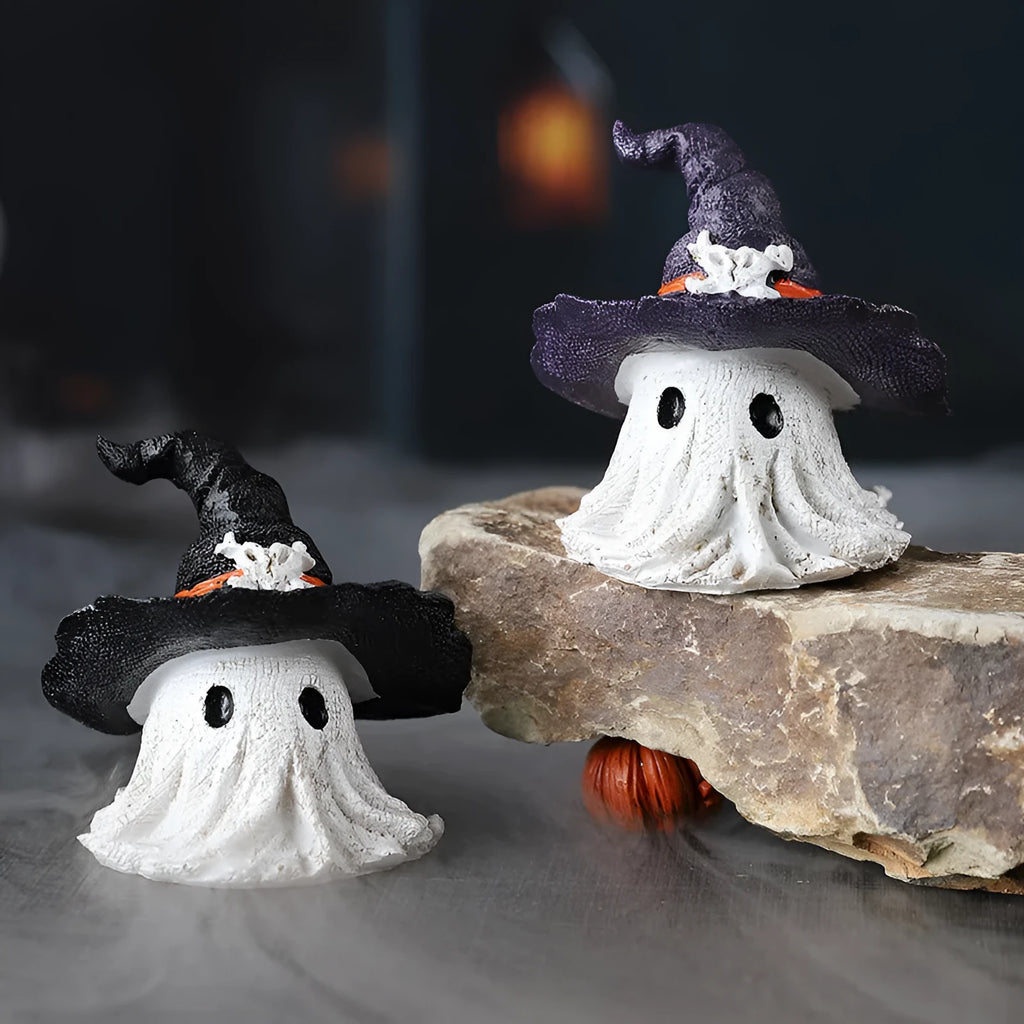 Resin wizard hat holiday ornament in purple or black, 7cm tall.