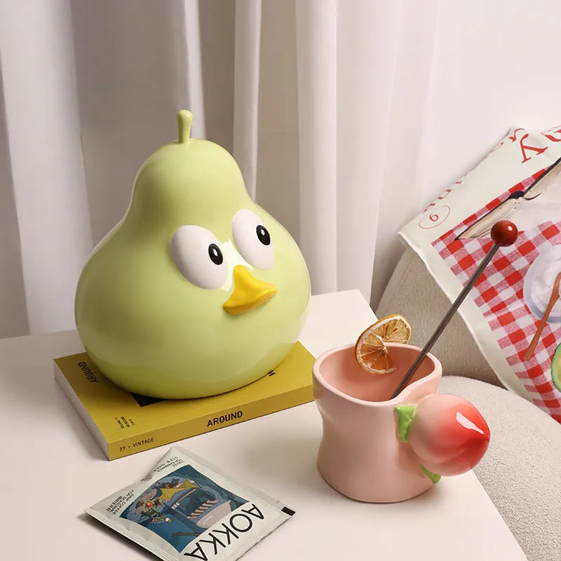 Cute pear-shaped ceramic tissue box in white porcelain with green or black colour options