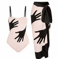 Women's patterned bikini swimsuit with a lightweight white tulle skirt attached.