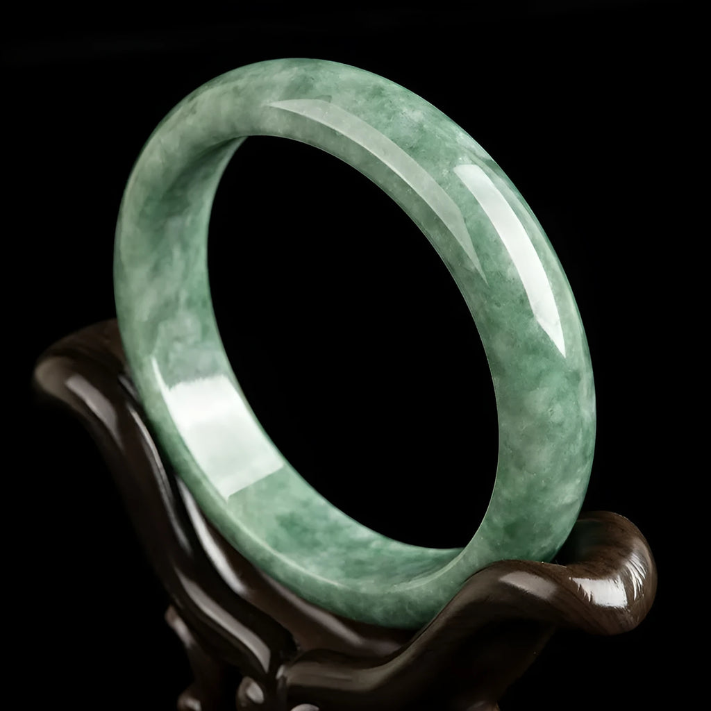 Deep pea green jade bracelet for women on a gift box, with certificate.