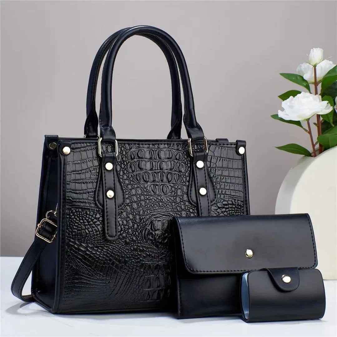 Contrast colour three-piece PU bag set showing crossbody bag, wallet, and card holder in burgundy.