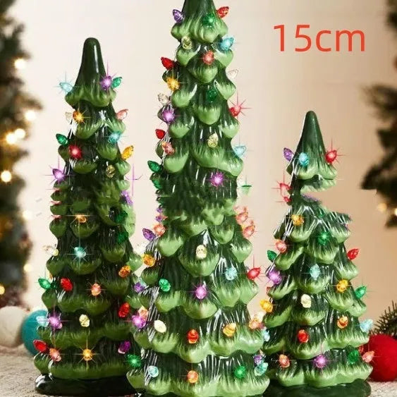 A decorative resin Christmas tree ornament with built-in LED lights, shown in European style.