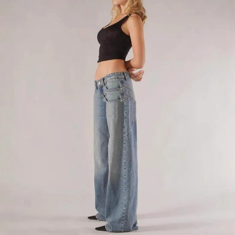 Women's blue cotton wide-leg mop trousers with low waist and splicing detail laid flat.