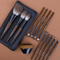 12-piece makeup brush set with wooden handles in PU travel case