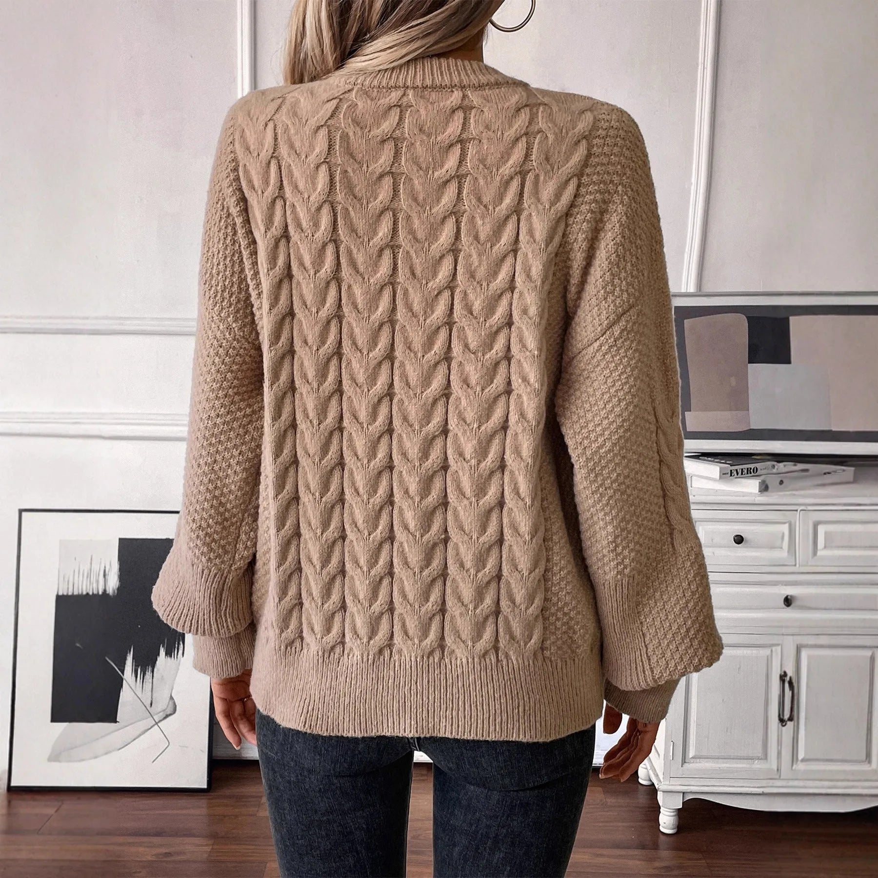 Women's beige loose sweater with twist stitch pattern and round neck