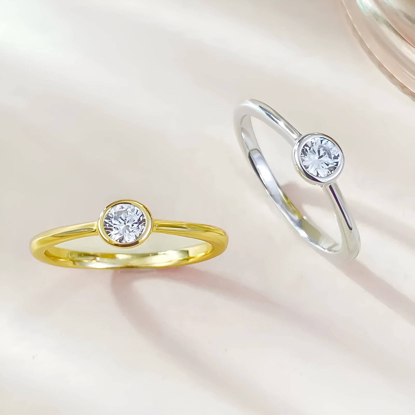 Minimalist silver crown-shaped ring with linear engraving detail in gold or platinum finish