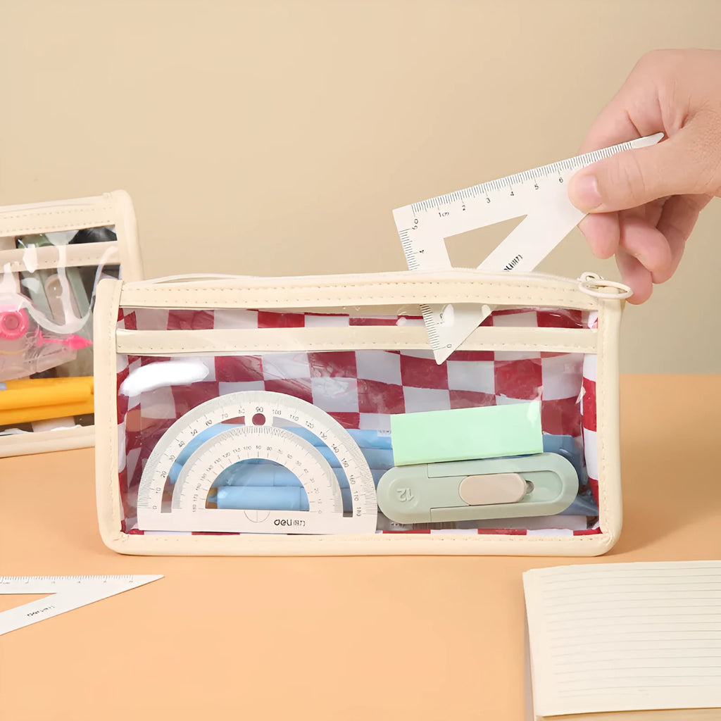 Transparent PVC pencil case with chessboard pattern showing pens inside, 21.5 cm length