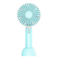 Blue portable USB electric fan with oscillation function and three-speed control on desktop