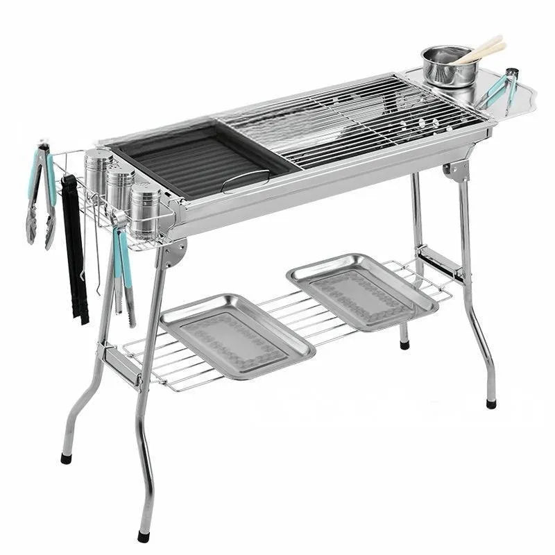 Stainless steel portable barbecue oven with charcoal stove and flip-over design