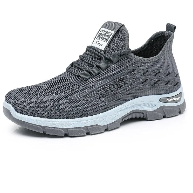 Men's and women's casual low-top sneakers with a soft PVC sole in black, red, light purple, grey, and brown.