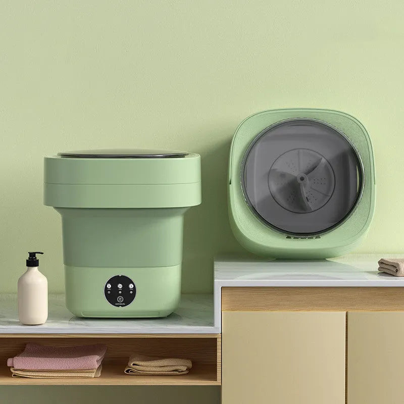 Mini foldable washing machine in green with blue light sterilisation and drain basket