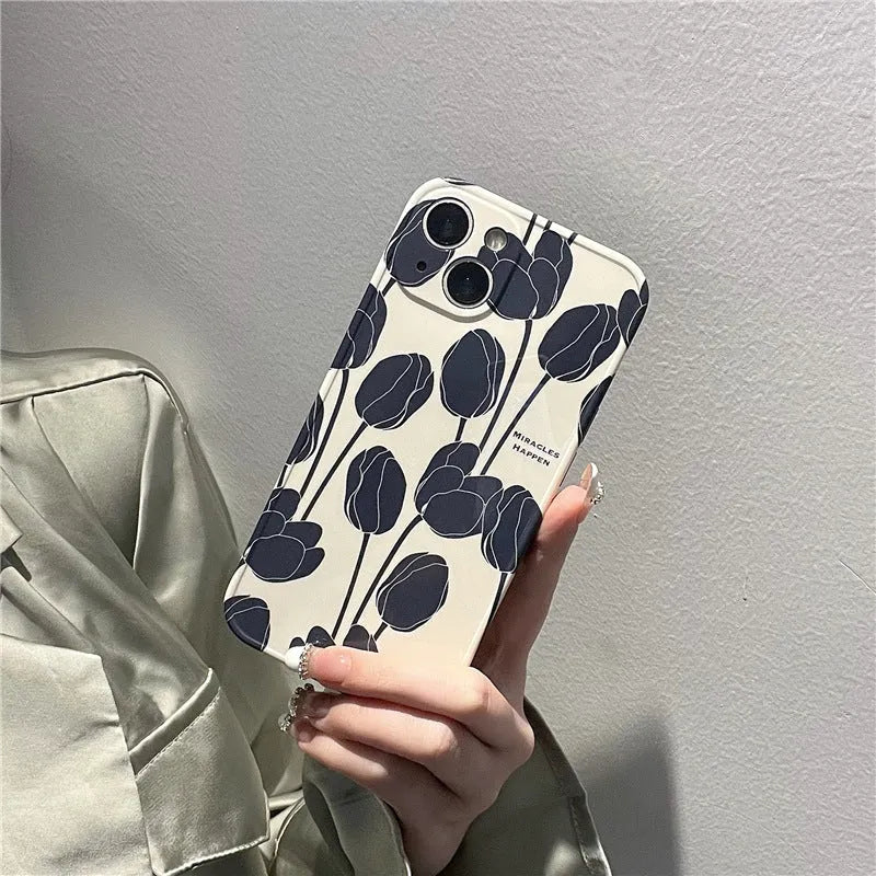Black tulip patterned silicone iPhone case shown on an iPhone