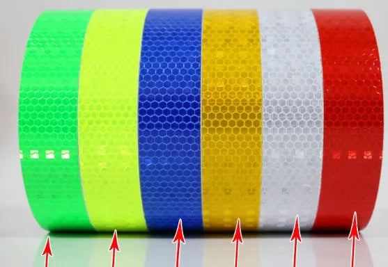 Close-up of solid colour reflective stripe roll with crystal lattice pattern, 10mm width, 8m length, in grass green colour.
