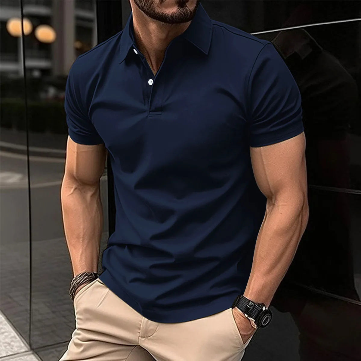 Men's solid colour short sleeve polo shirt with button lapel on a hanger
