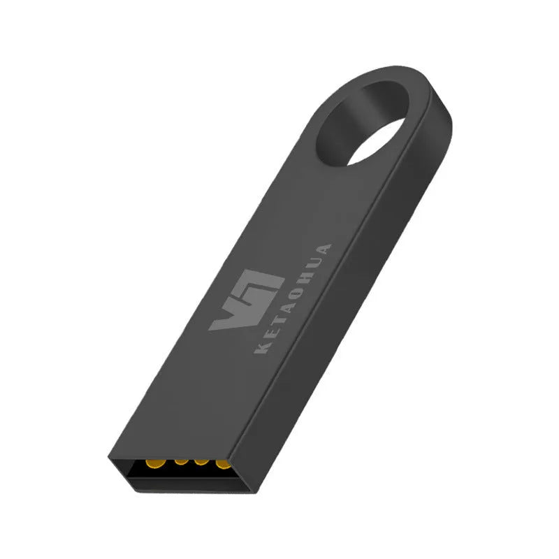 Silver metal car-shaped USB flash drive on a white background showing compact size.